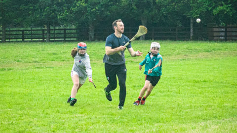 Richie English enjoys a game of hurling with children staying at Fitzgeralds Woodlands House Hotel